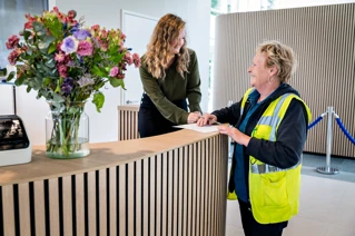 Receptioniste en schoonmaakster
